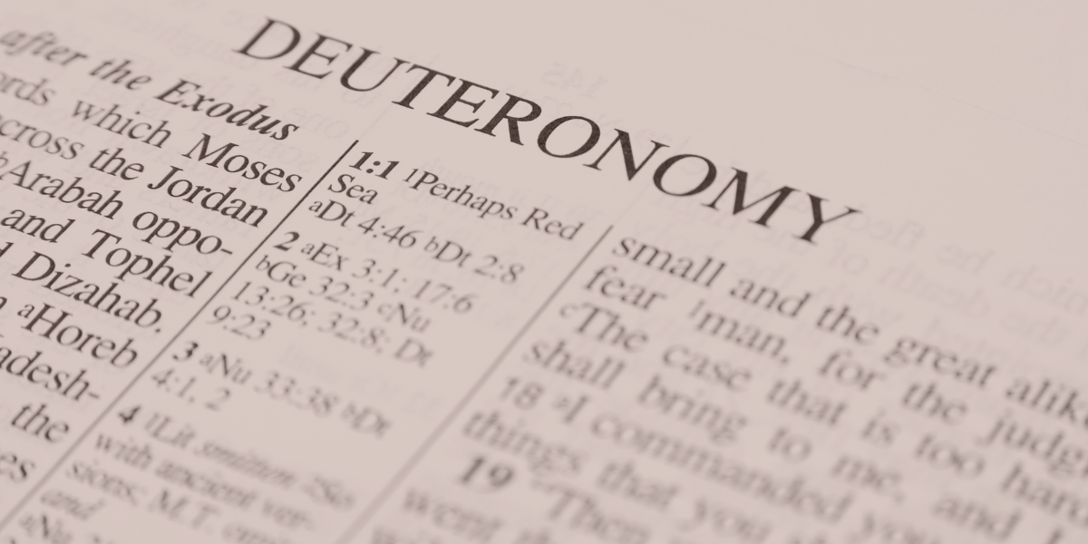 Open Bible turned to the book of Deuteronomy, illustrating sermon preparation and expository preaching.